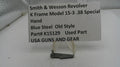Smith & Wesson revolver part with descriptive label on a white surface