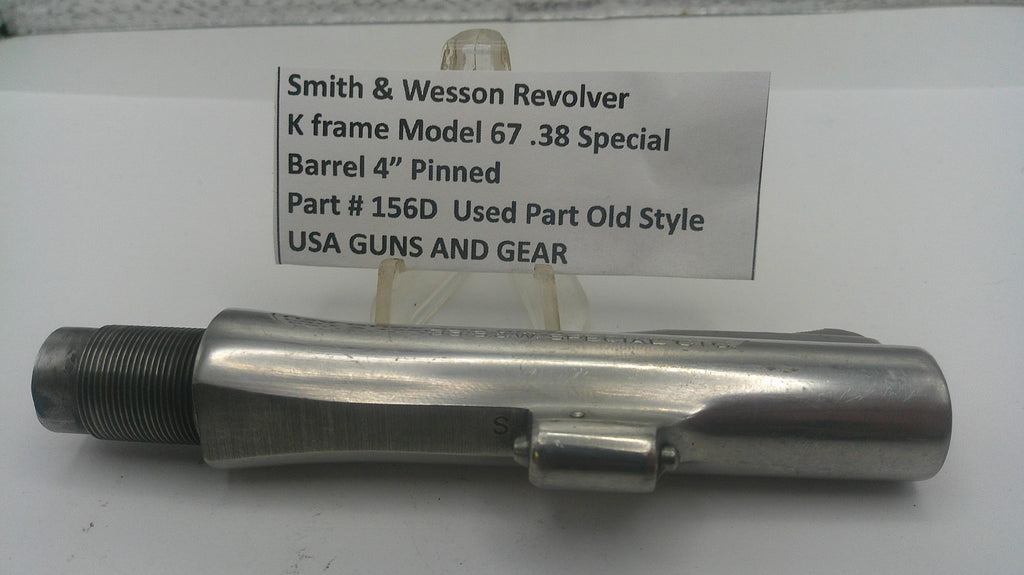 Metal gun barrel with a label detailing specifications on a white background