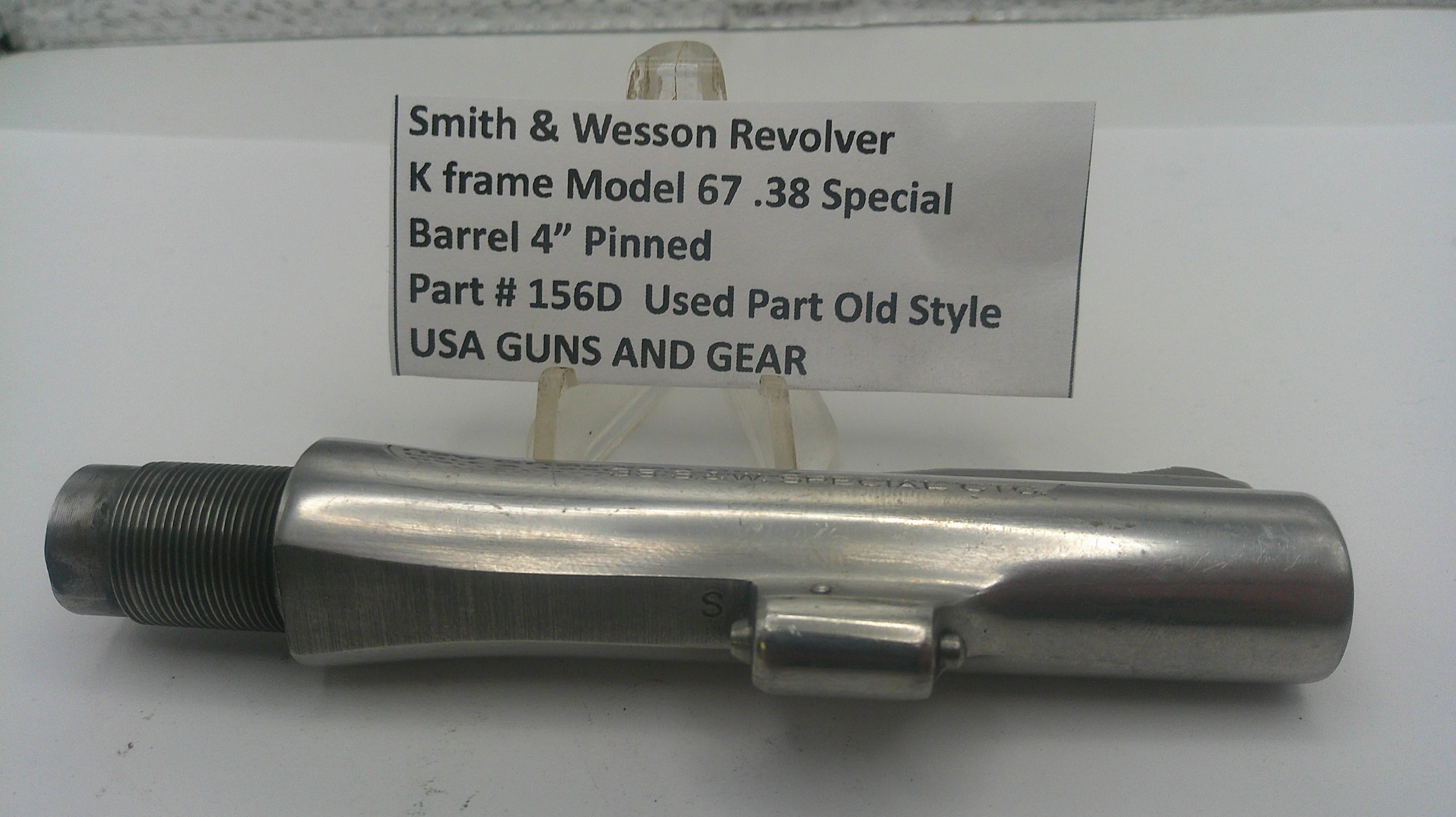 Metal gun barrel with a label detailing specifications on a white background