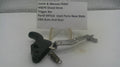 Smith & Wesson M&P9 Shield 9mm pistol trigger bar replacement part, part number MPS16, shown on a white display stand with a handwritten label card.