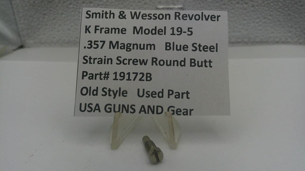 Smith & Wesson revolver part with descriptive sign on a white background
