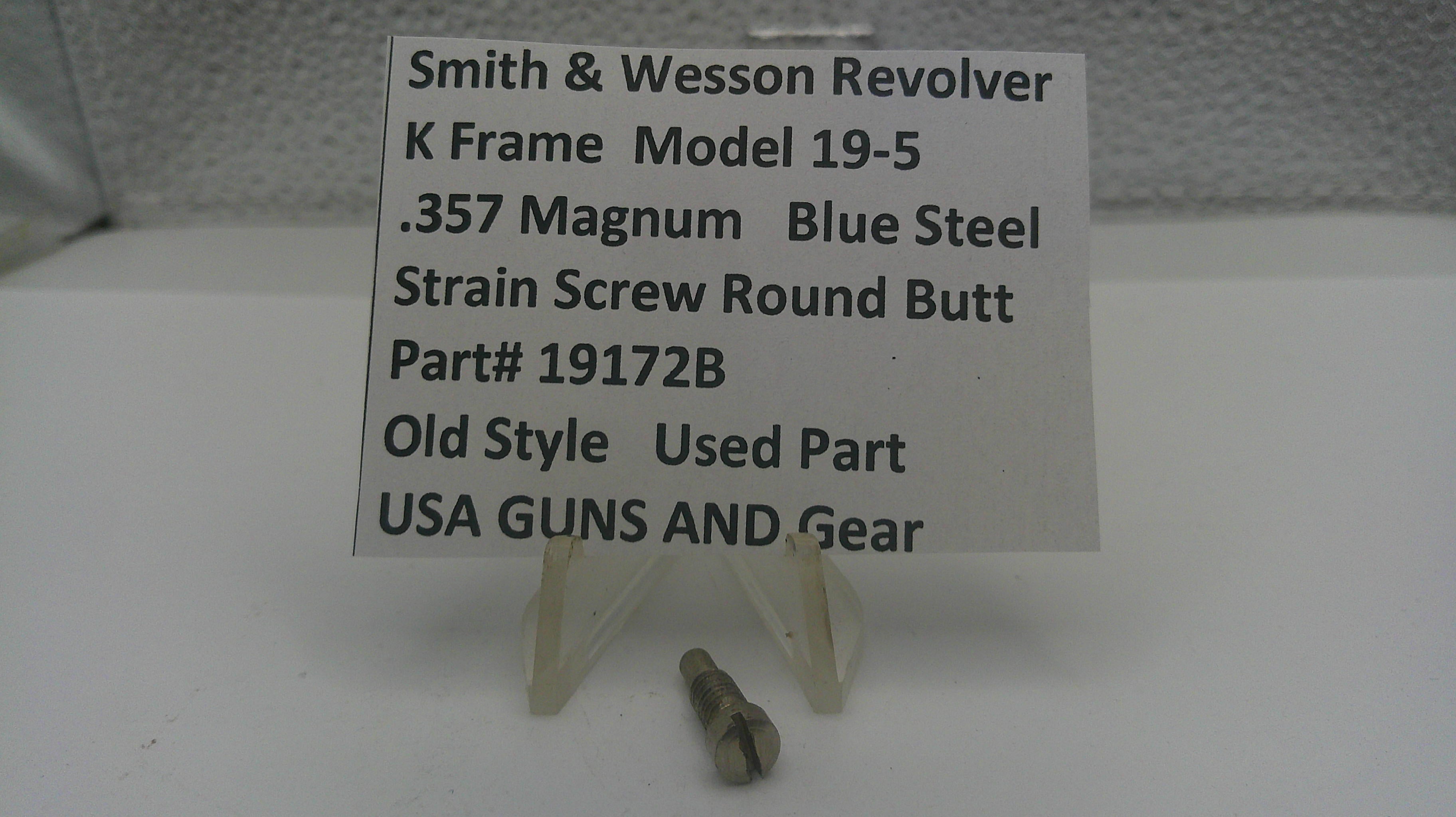 Smith & Wesson revolver part with descriptive sign on a white background