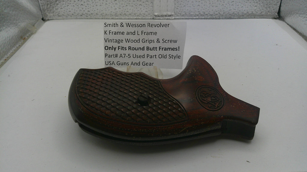 Brown gun butt stock with text on a white surface