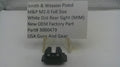 A black Smith & Wesson M&P M2.0 full-size white dot rear sight (MIM) part on a clear plastic display stand, with a white paper label card behind it on a white surface.