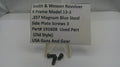Three small black metal screws displayed in front of a white sign that reads 'Smith & Wesson Revolver K Frame Model 13-3 .357 Magnum Blue Steel Side Plate Screws 3 Part# 19160B Used Part (Old Style) USA Guns And Gear' on a small clear stand.