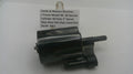 Smith & Wesson revolver cylinder with a label on a white background