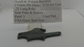 A used black metal side plate and screws kit for a Smith & Wesson revolver, displayed on a clear plastic stand with a paper label card. The label reads 'Smith & Wesson Revolver I Frame Pre Model 22/32 Kit Gun .