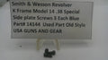 Three small black metal screws displayed on a clear plastic stand in front of a white sign that reads 'Smith & Wesson Revolver K Frame Model 14 .38 Special Side plate Screws 3 Each Blue Part# 14144 Used Part Old Style USA GUNS AND GEAR'.
