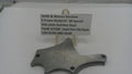 Smith & Wesson revolver side plate on a white background with a label.