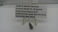 Strain screw with a sign describing Smith & Wesson Revolver details on a white background