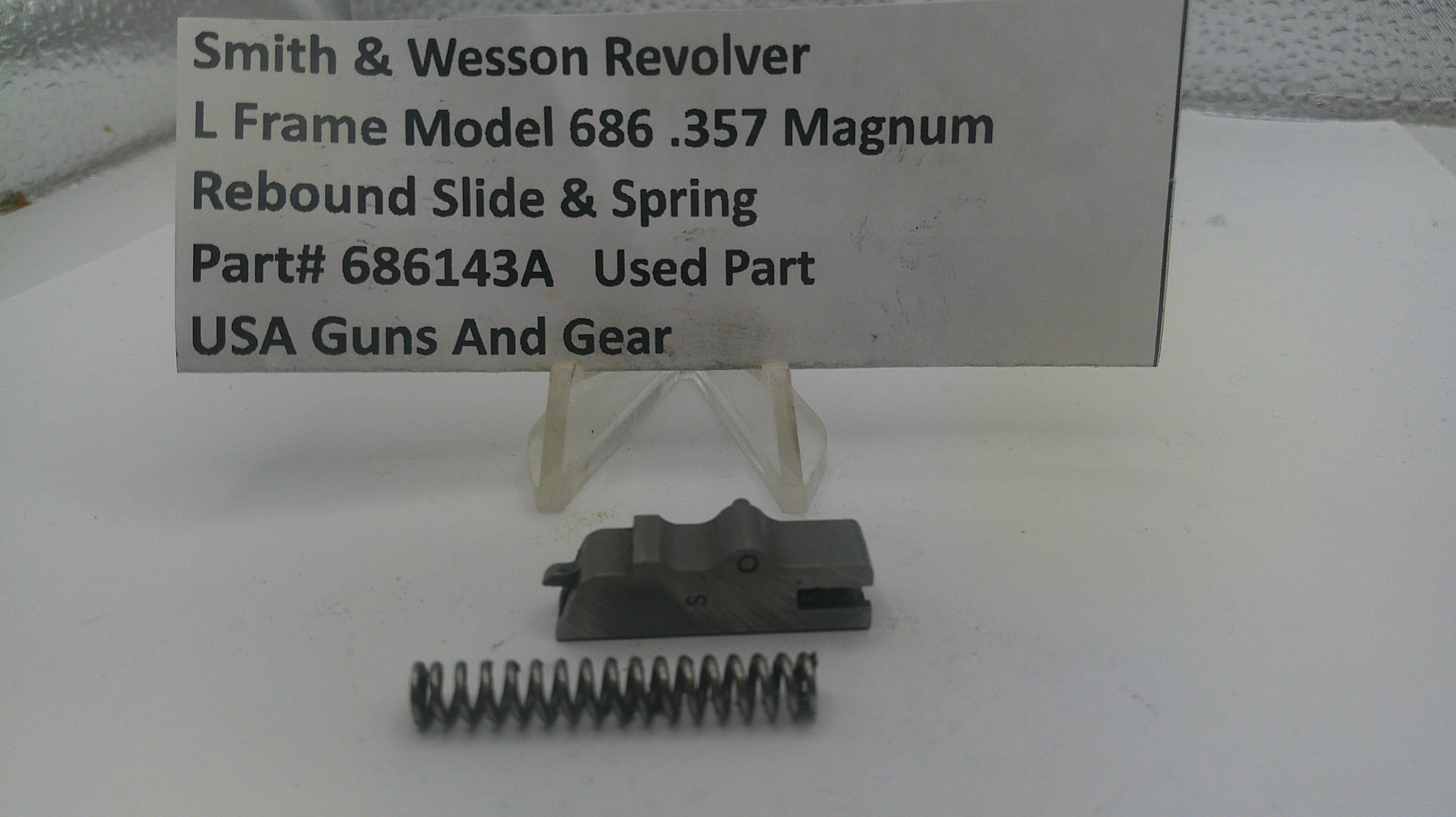 Smith & Wesson revolver part with spring on a white background, labeled 'USA Guns And Gear'.
