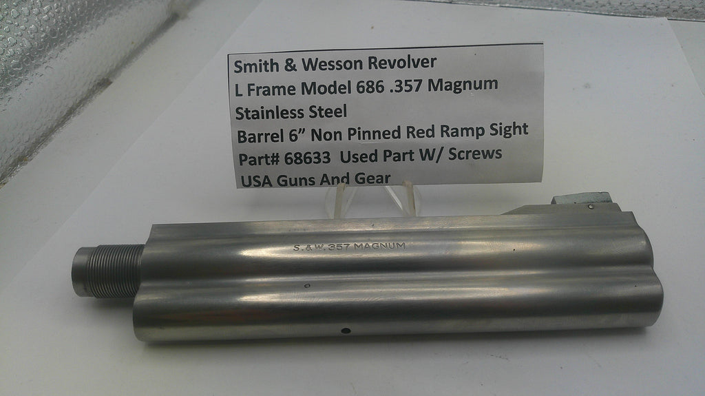 Smith & Wesson revolver barrel on a white surface with a label providing details.