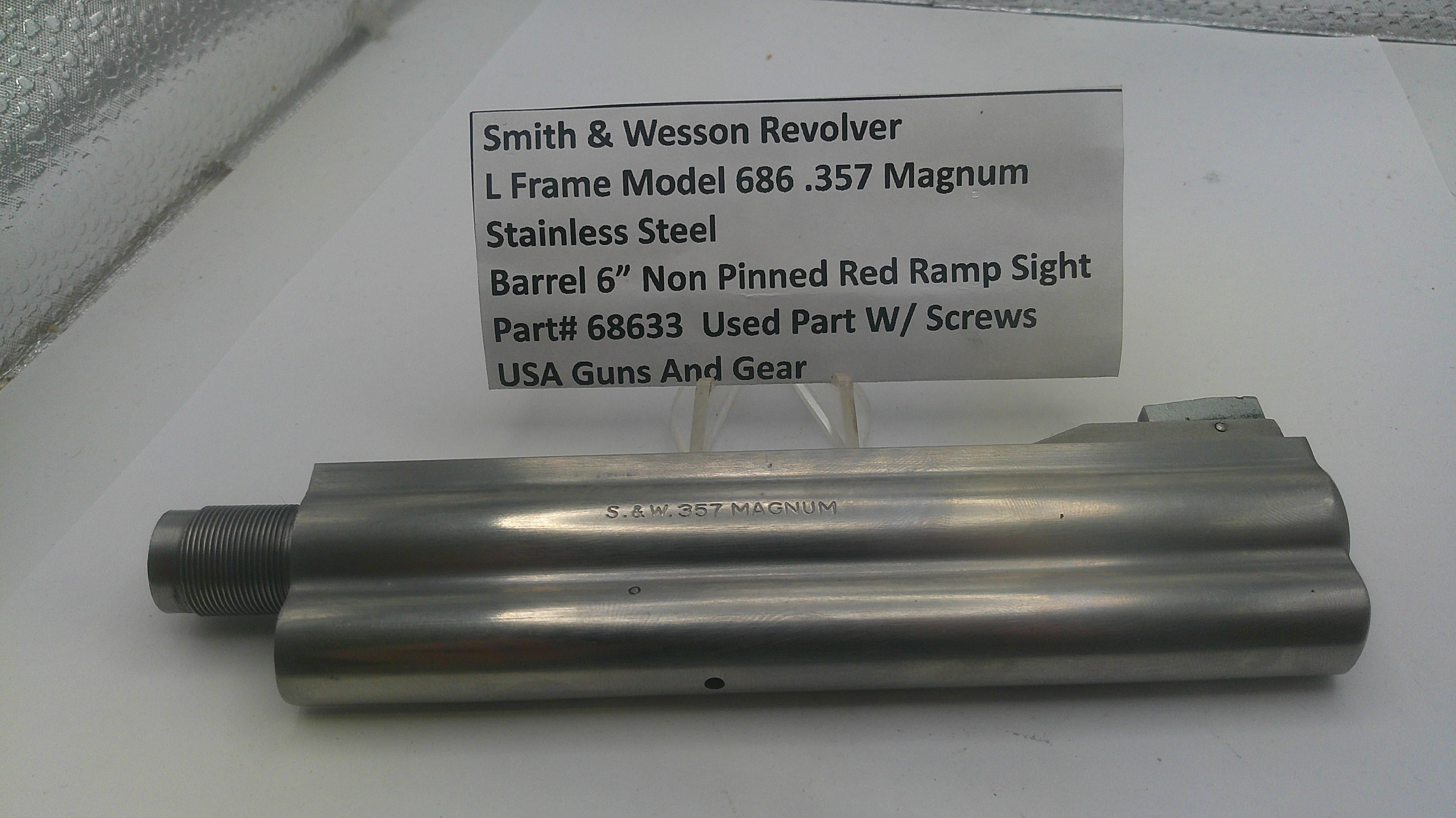 Smith & Wesson revolver barrel on a white surface with a label providing details.