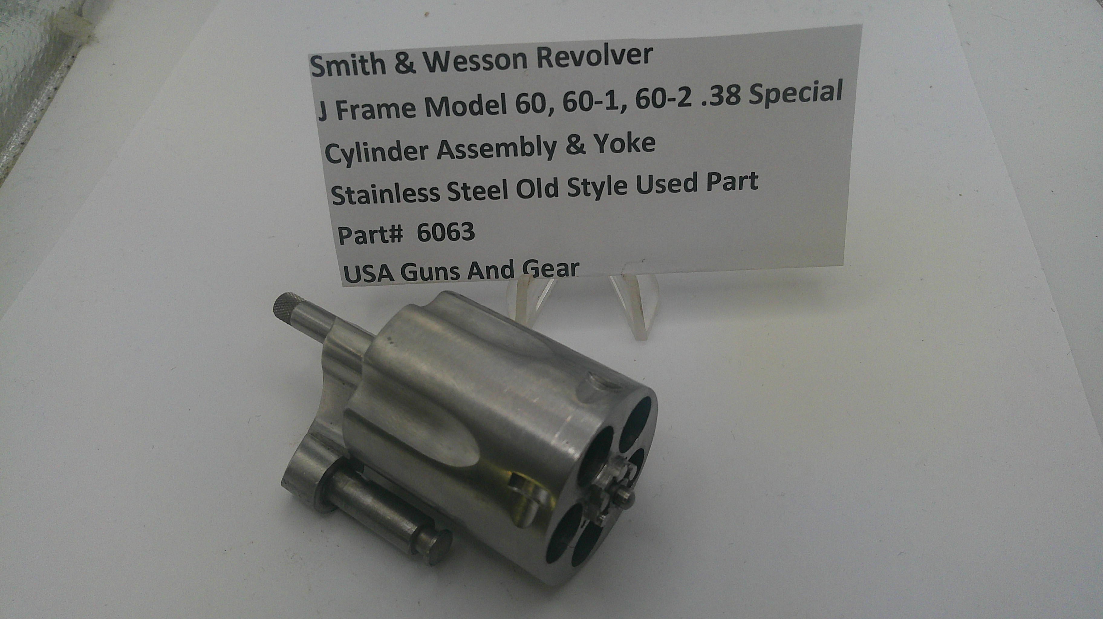 Smith & Wesson revolver cylinder assembly on a white background with a label.