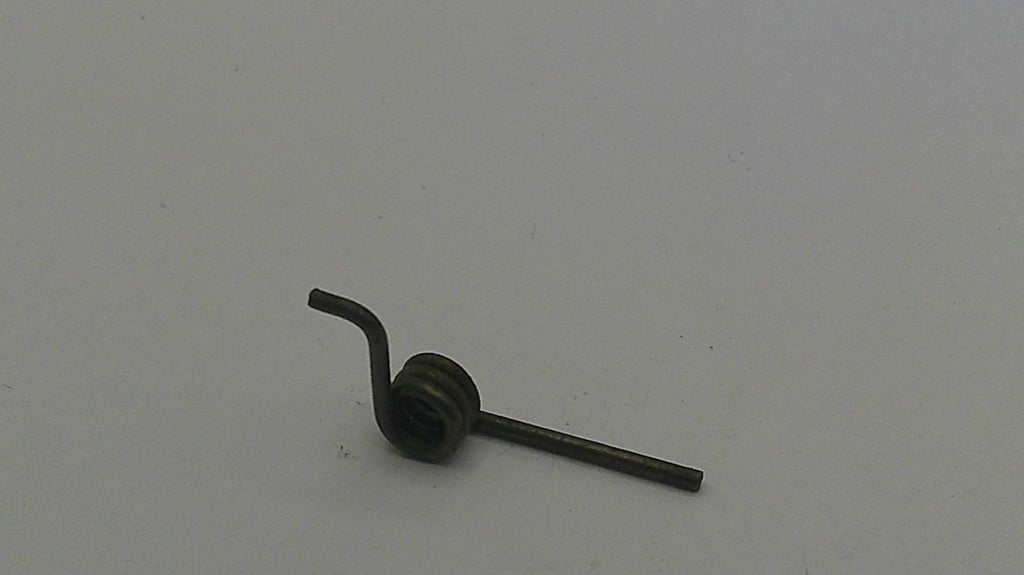 Small metal component on a light gray background