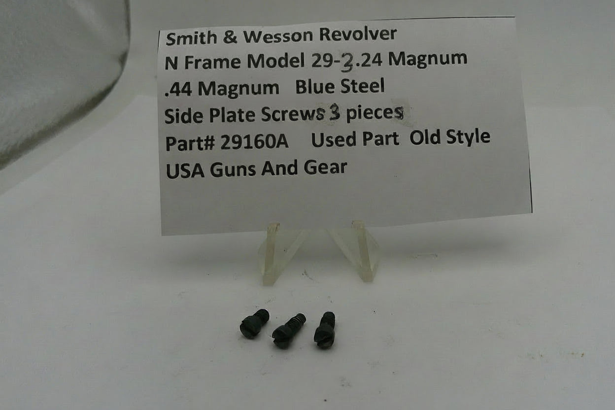 Smith & Wesson revolver parts with a label on a white background