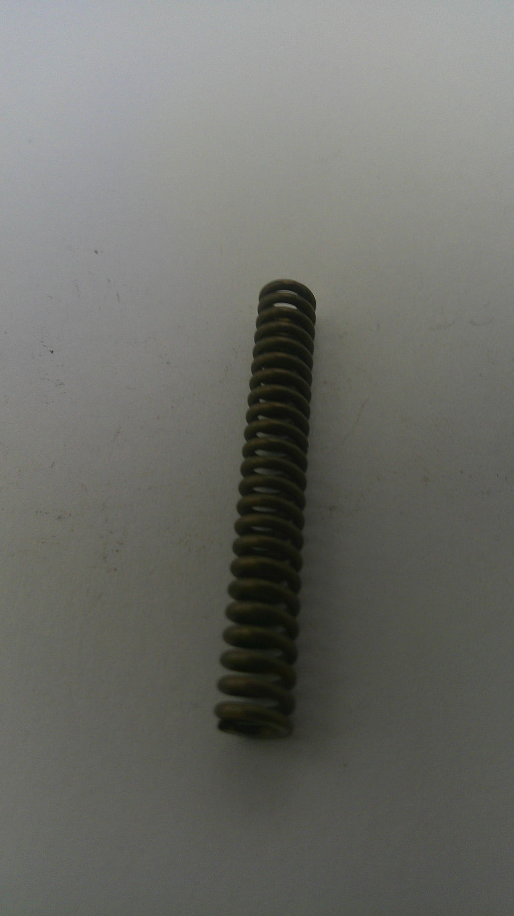 Coiled spring on a white background