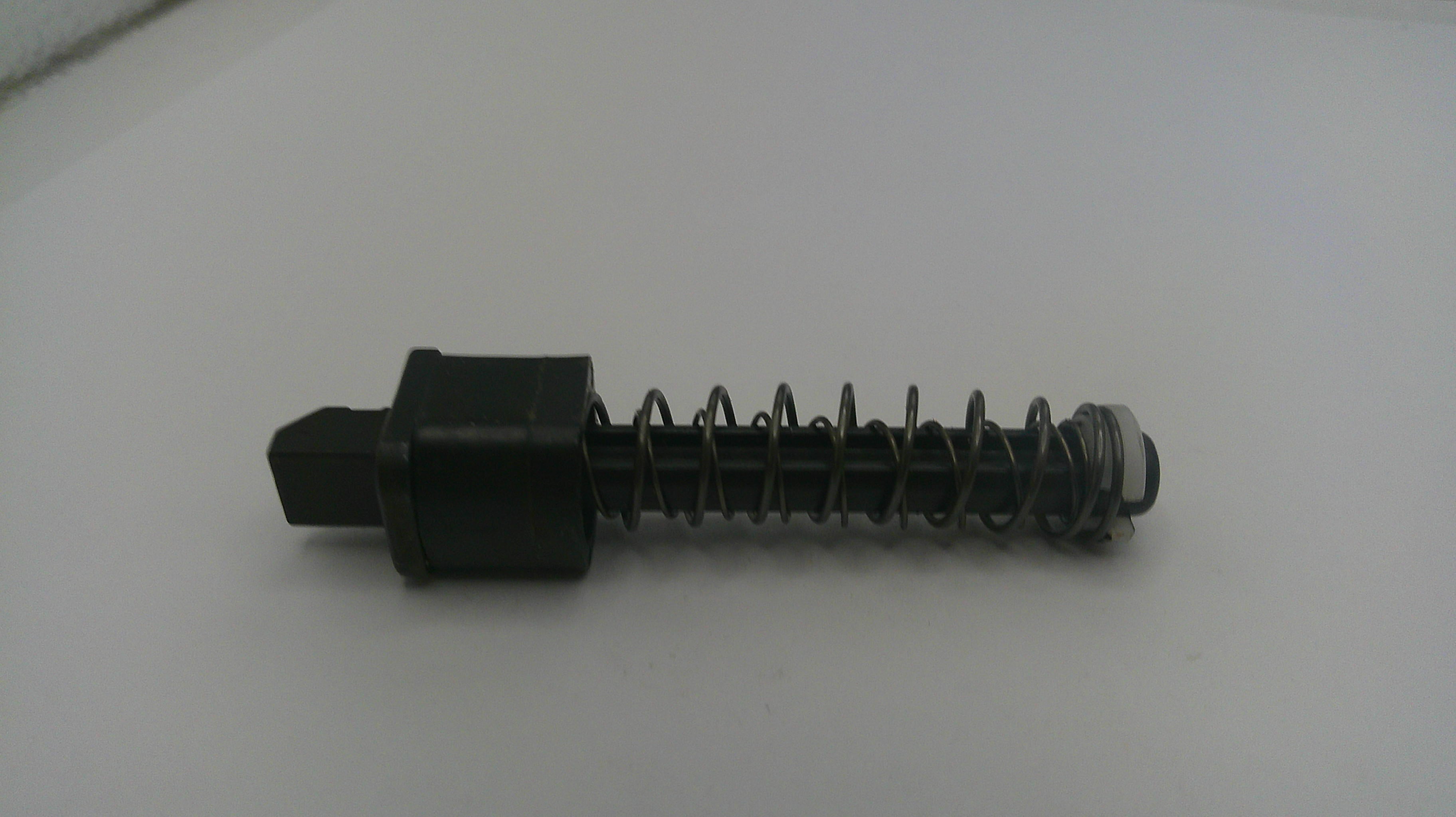 Mechanical component with a spring on a white background