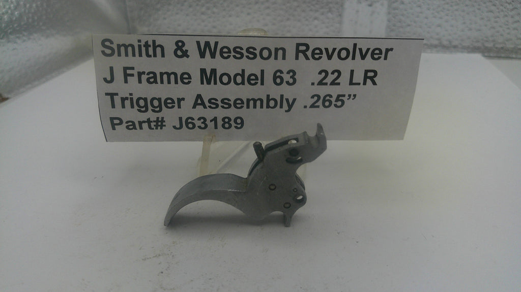 Smith & Wesson Revolver J Frame Model 63 .22 LR trigger assembly on a white background with a label.