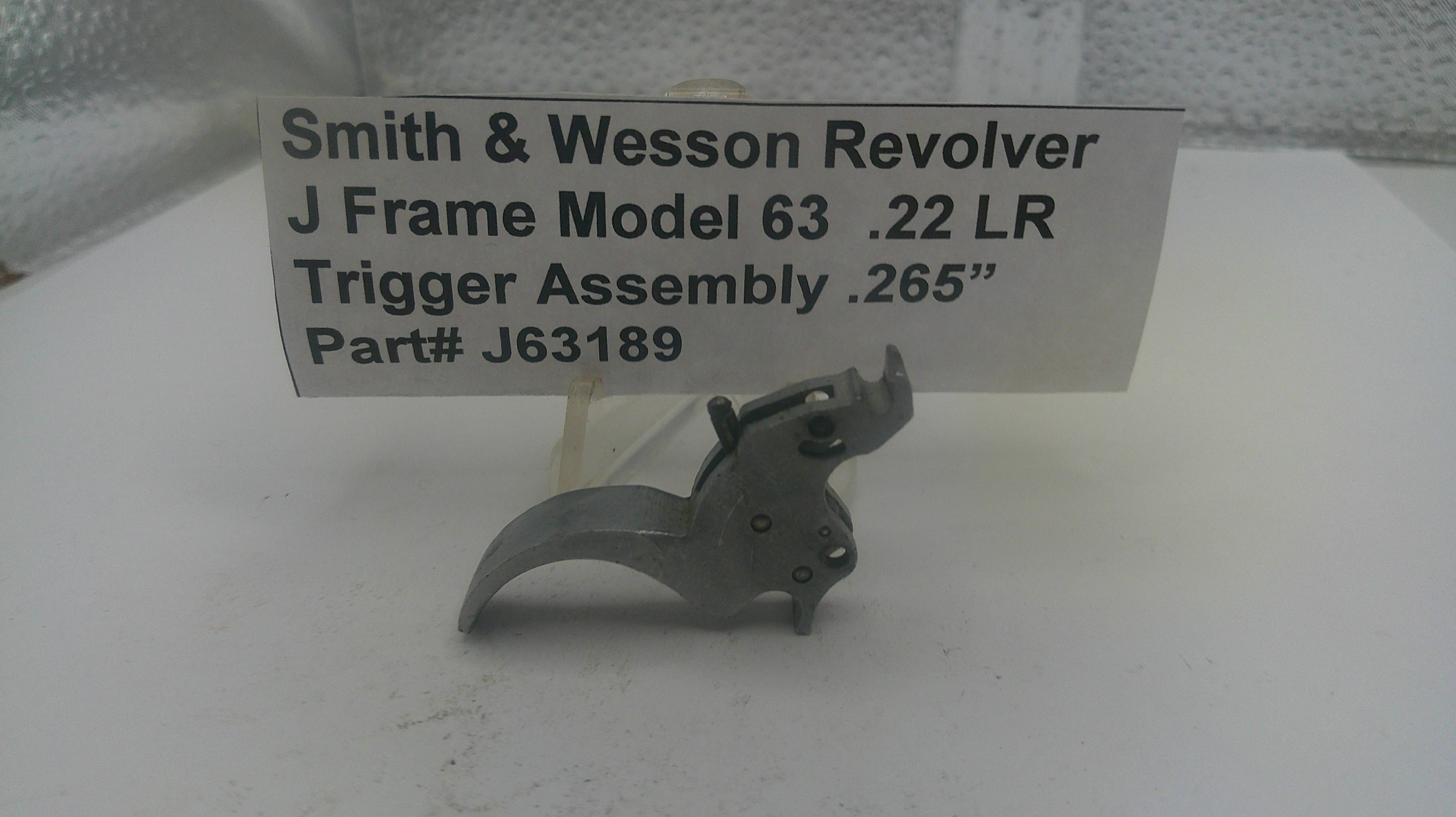 Smith & Wesson Revolver J Frame Model 63 .22 LR trigger assembly on a white background with a label.