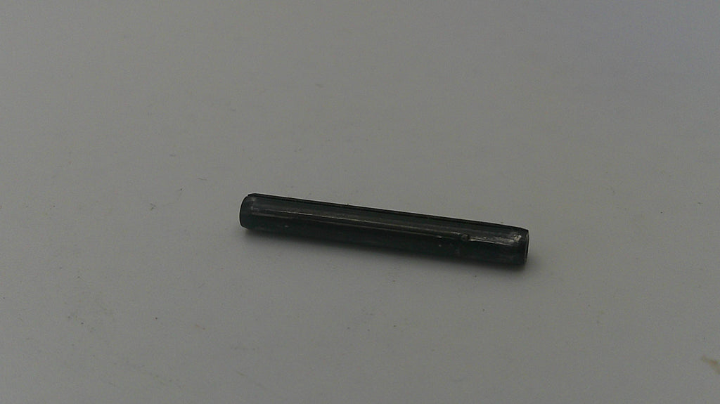 Long, thin black object on a light gray background