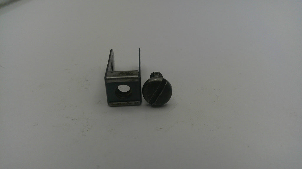 Small metal bracket and screw on a white background