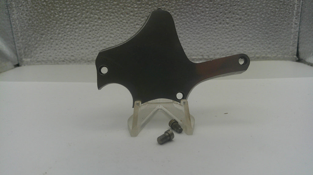 Black metal bracket with two screws on a white surface