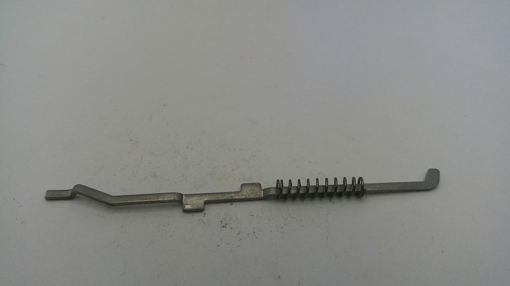 Metal tool with a spring on a white background