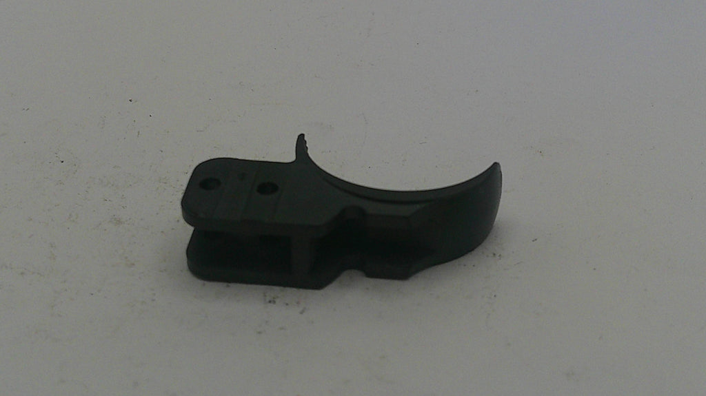 Black plastic component on a white background