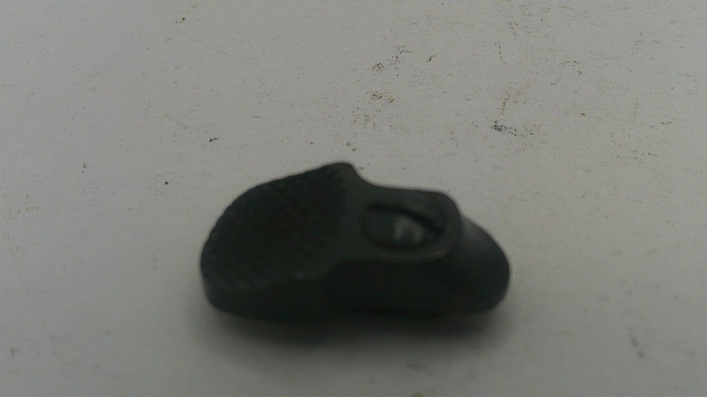 Black rubber band on a white surface