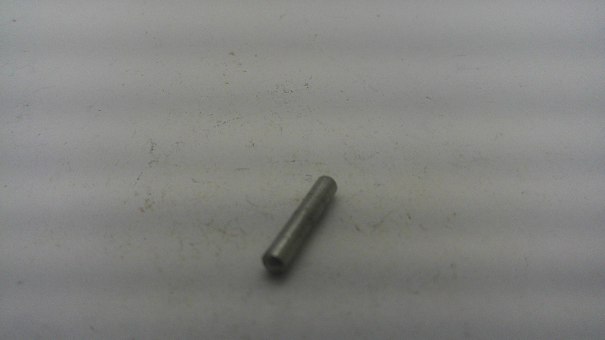 Smith & Wesson stainless steel revolver grip pin, angled view, used, inventory reference N205