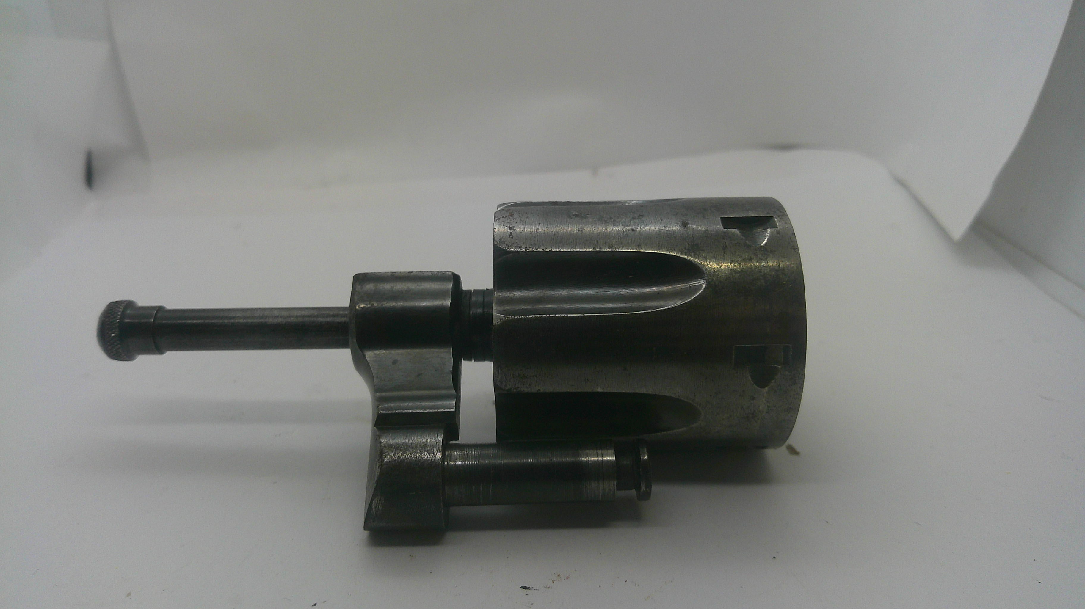 A used metal mechanical part, likely a cylinder head bolt carrier or similar engine component, shown on a plain white background.