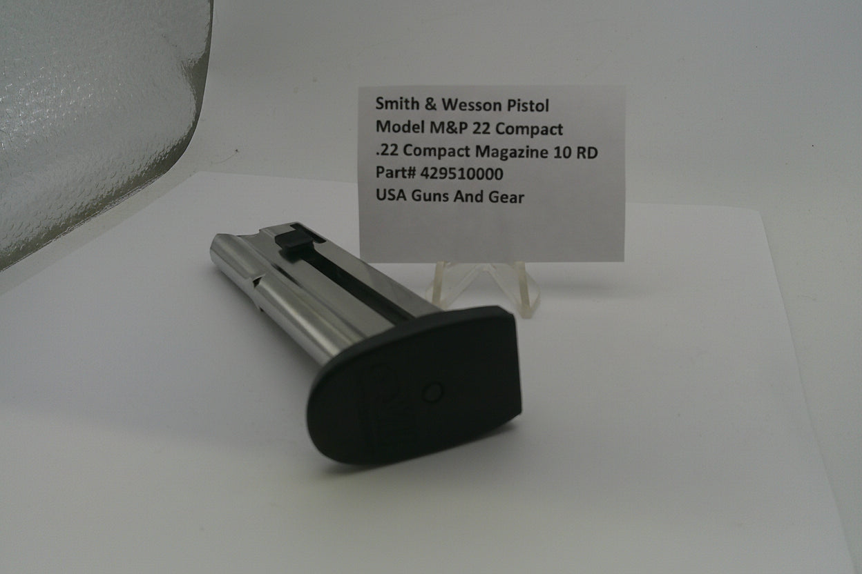 Smith & Wesson pistol magazine with a label on a white background