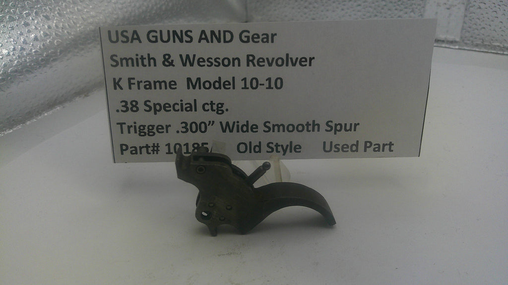 Smith & Wesson revolver trigger on a stand with descriptive label