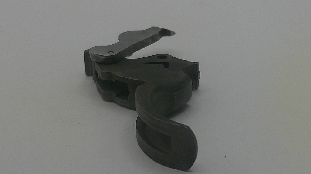 Metallic object with a number '7' on a white background
