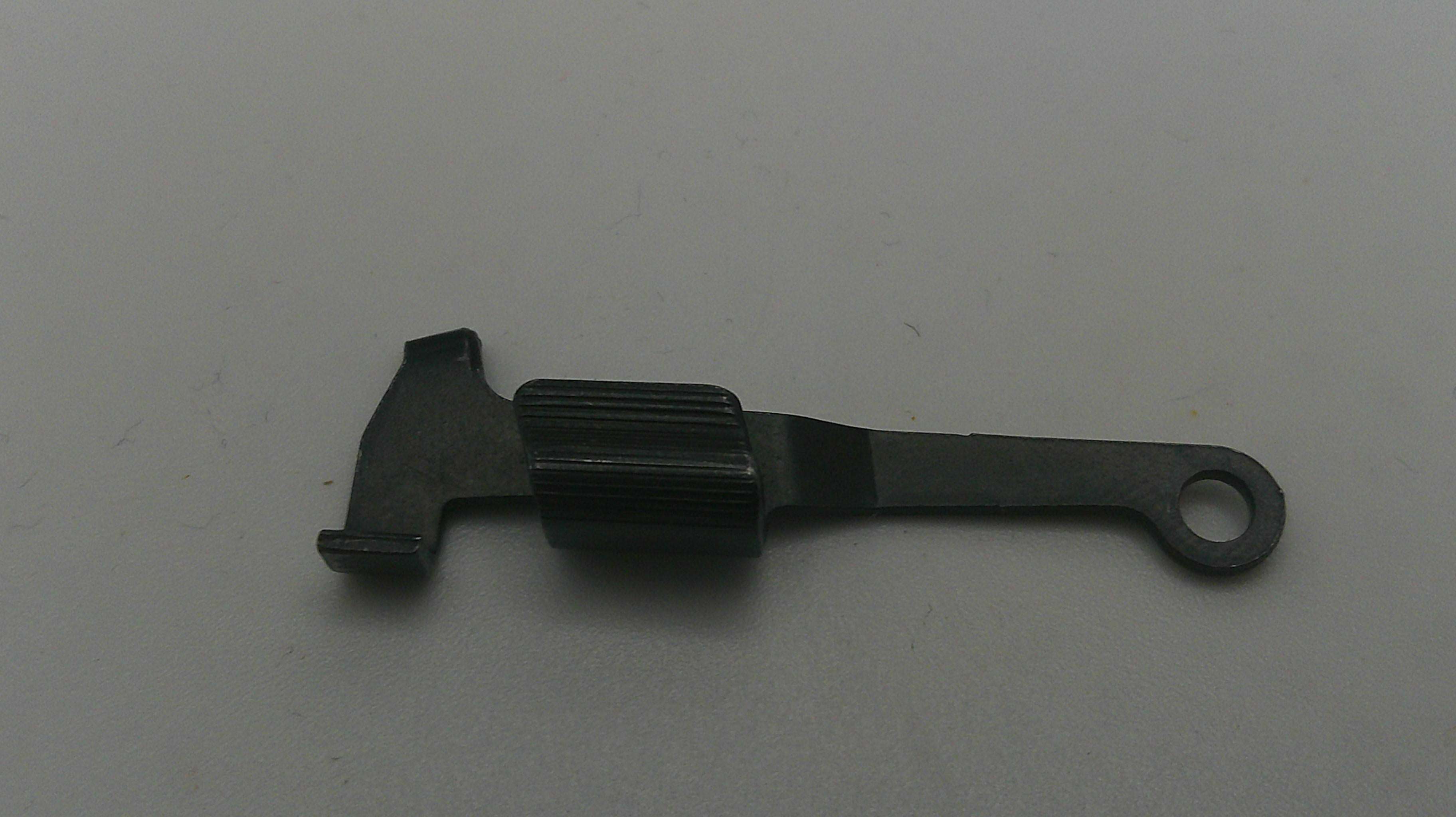 Black plastic tool on a white background