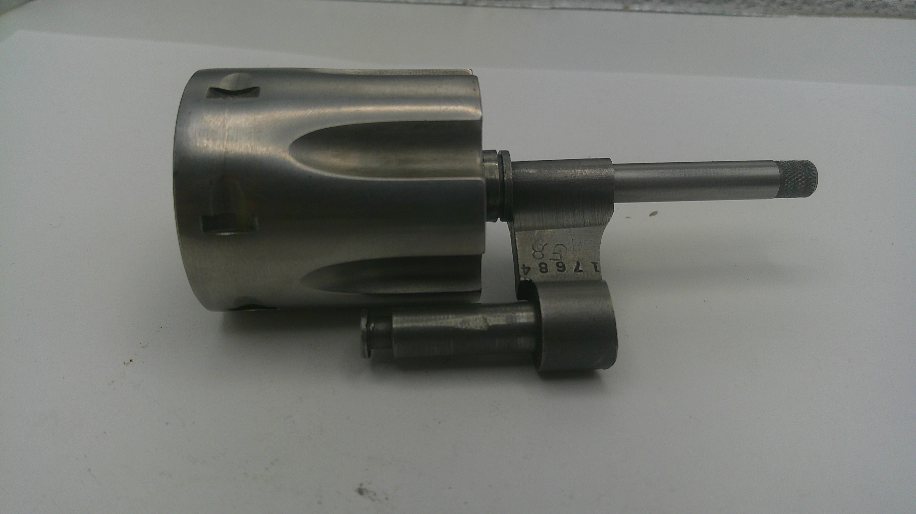 Metal cylindrical component on a white background