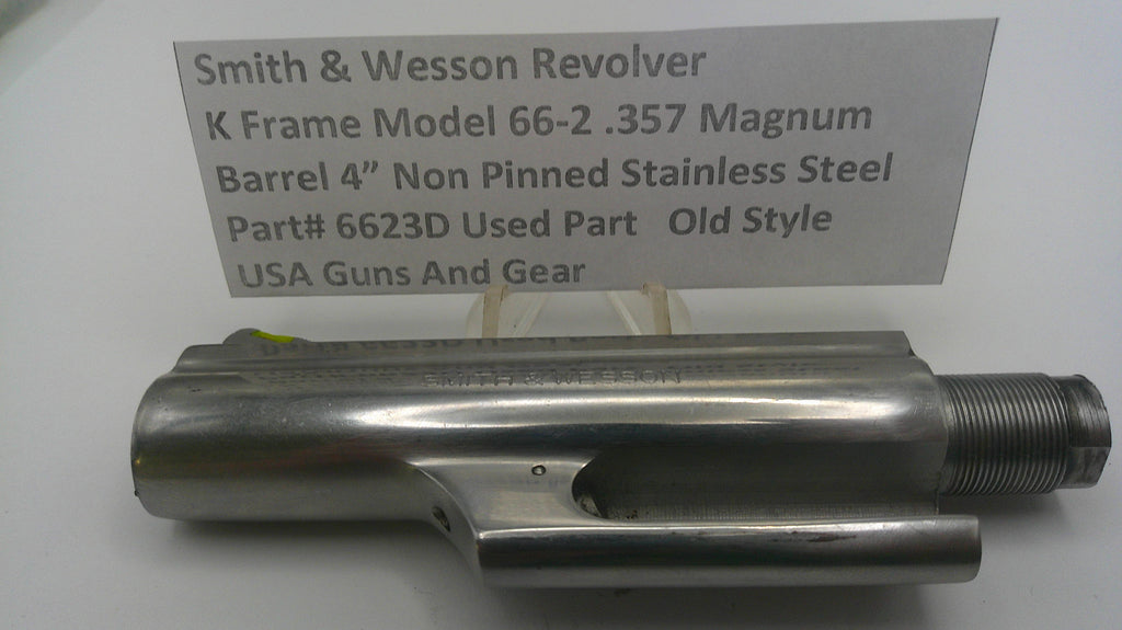 Smith & Wesson revolver barrel on a white background with a label.
