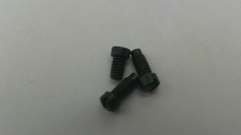Two black screws on a light gray background