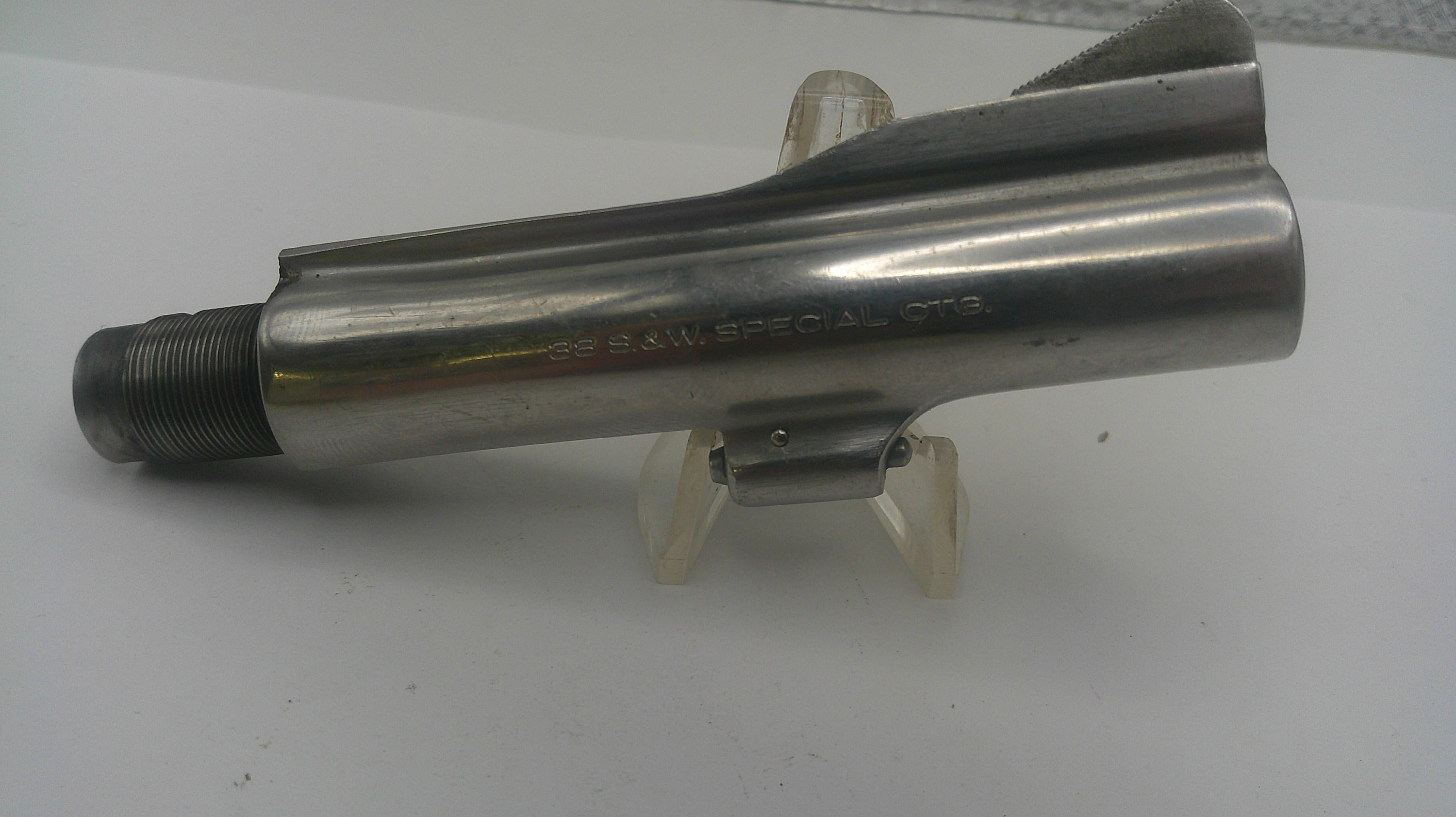 Metal tool or component on a white background