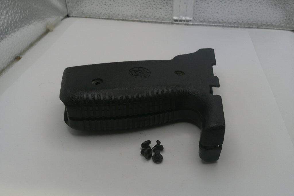 Black gun stock and screws on a white surface