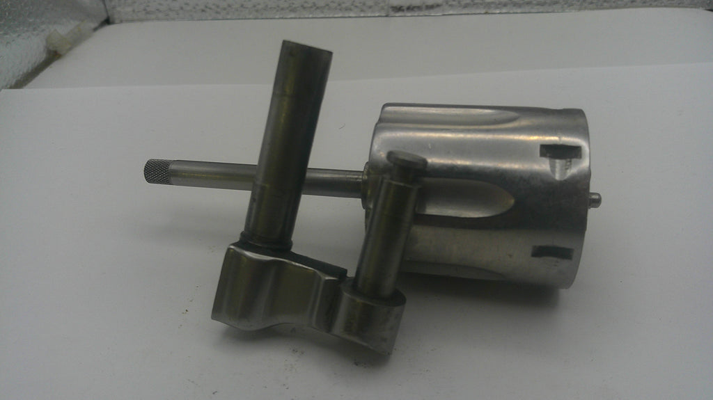Metal mechanical component on a white surface
