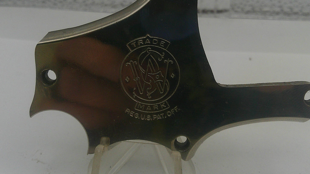 Metallic object with a brand logo on a white background