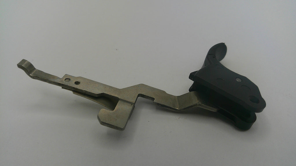 Metallic and black mechanical component on a white background