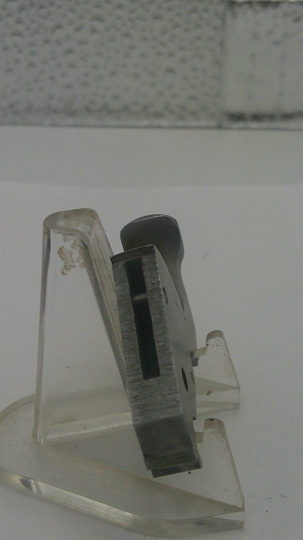 Shaving razor with clear handle on a white background