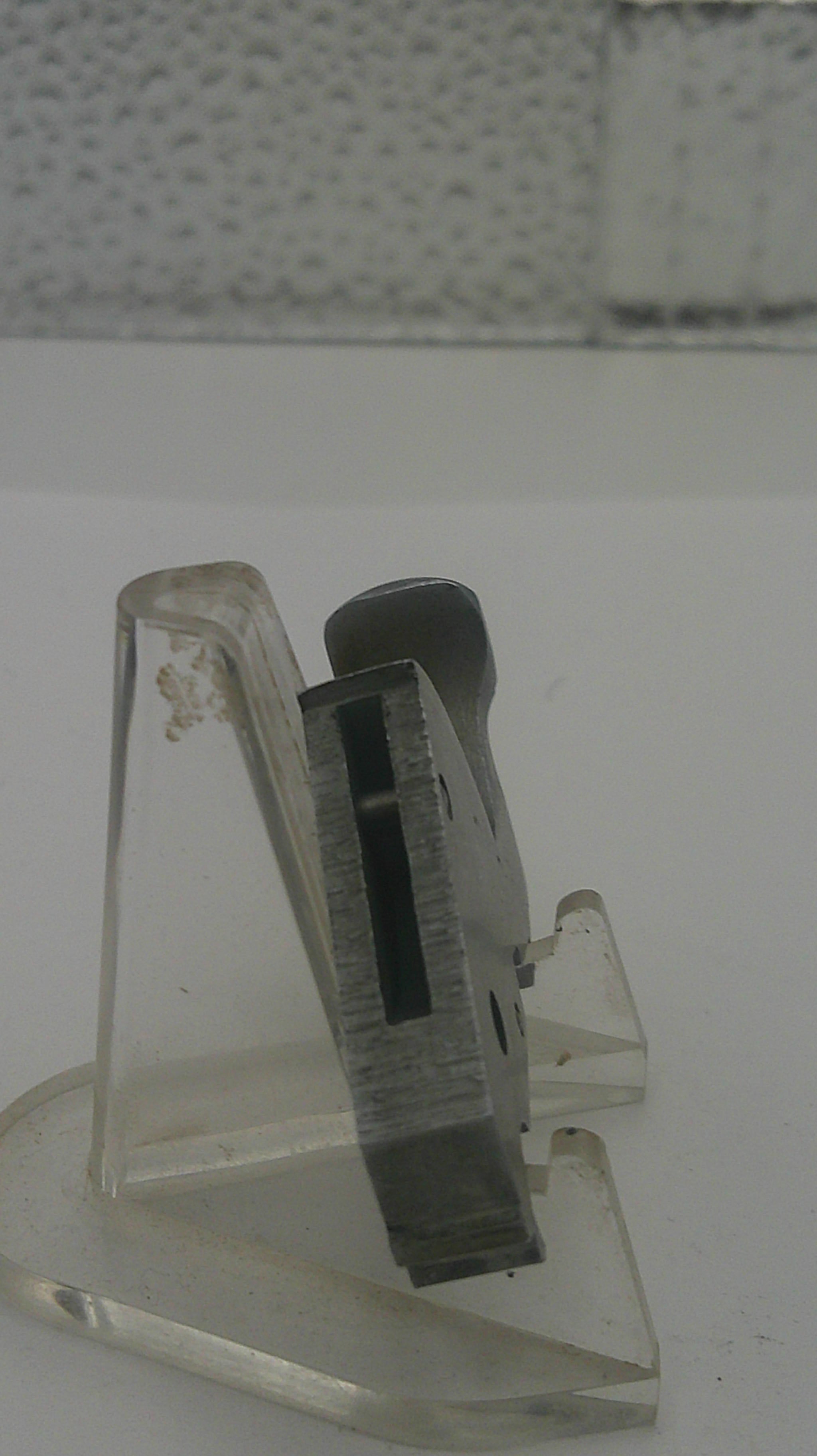 Shaving razor with clear handle on a white background