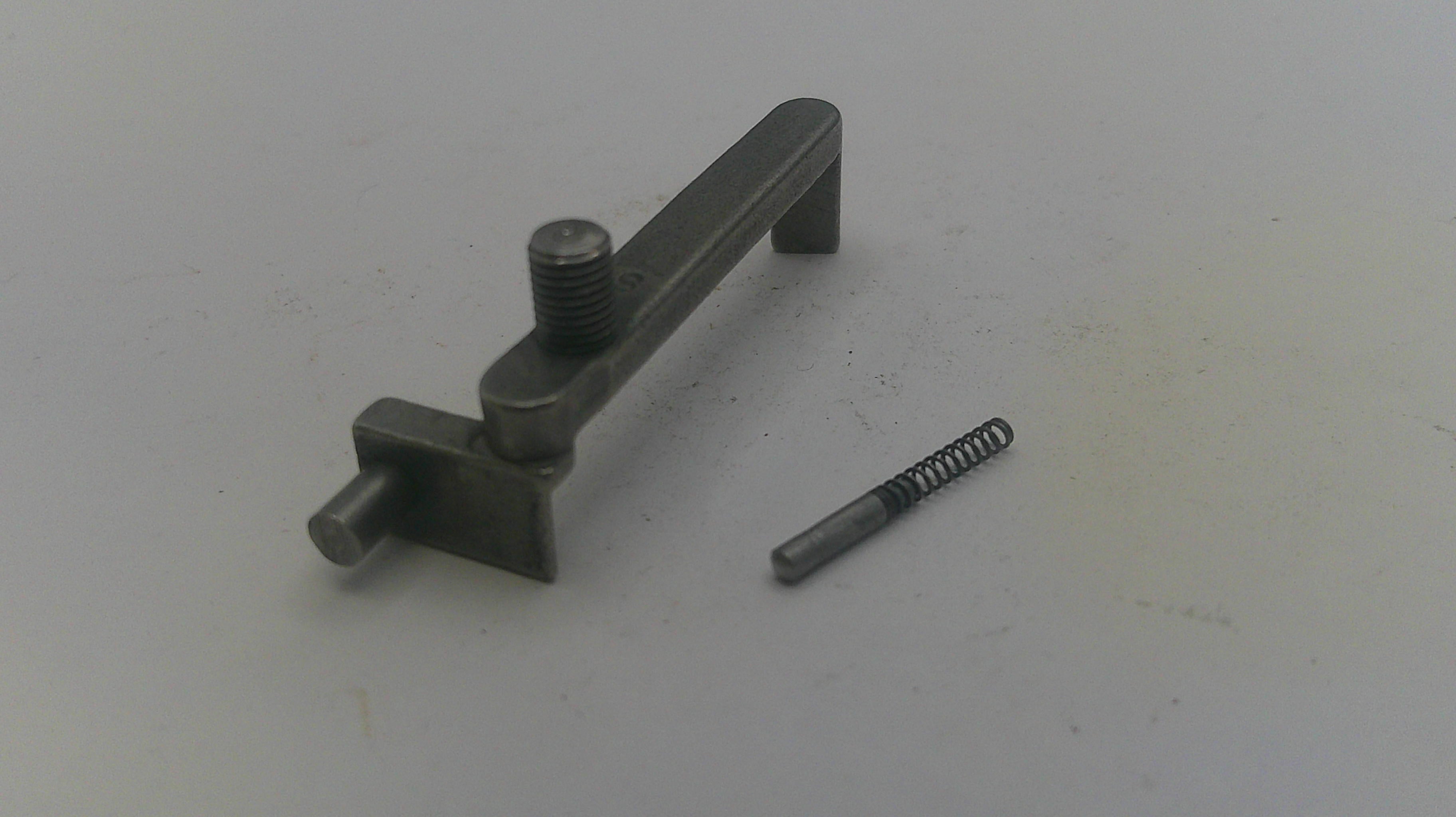 Metal lever and spring on a white background