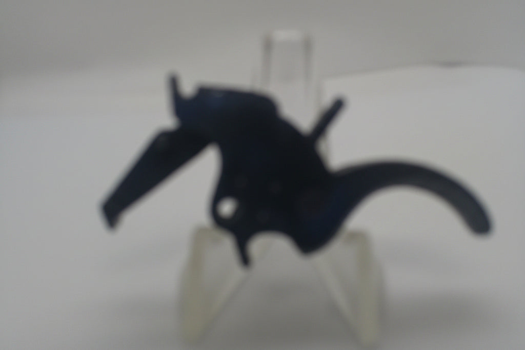 A small black horse figurine displayed on a clear plastic stand against a plain white background.