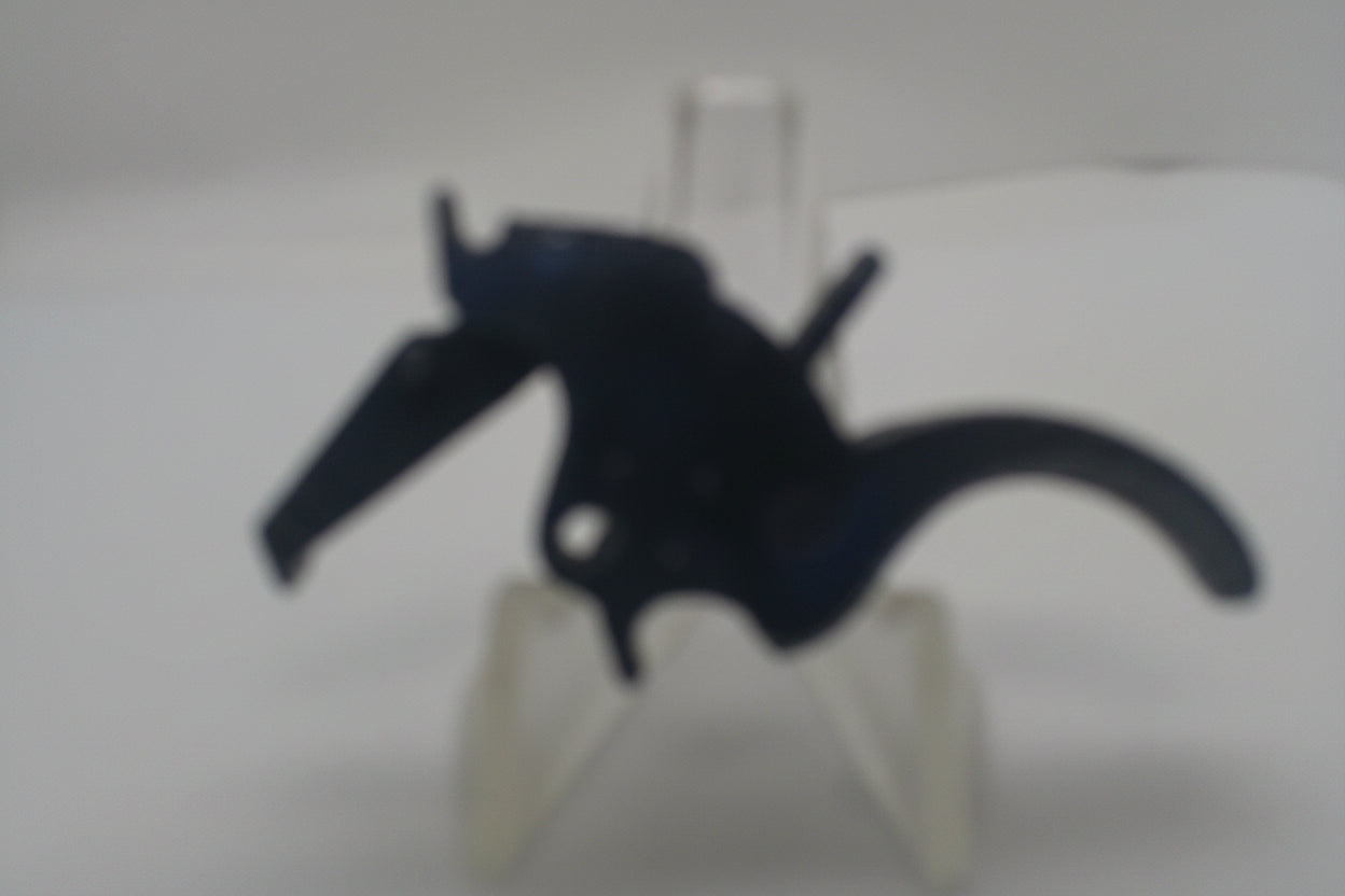 A small black horse figurine displayed on a clear plastic stand against a plain white background.
