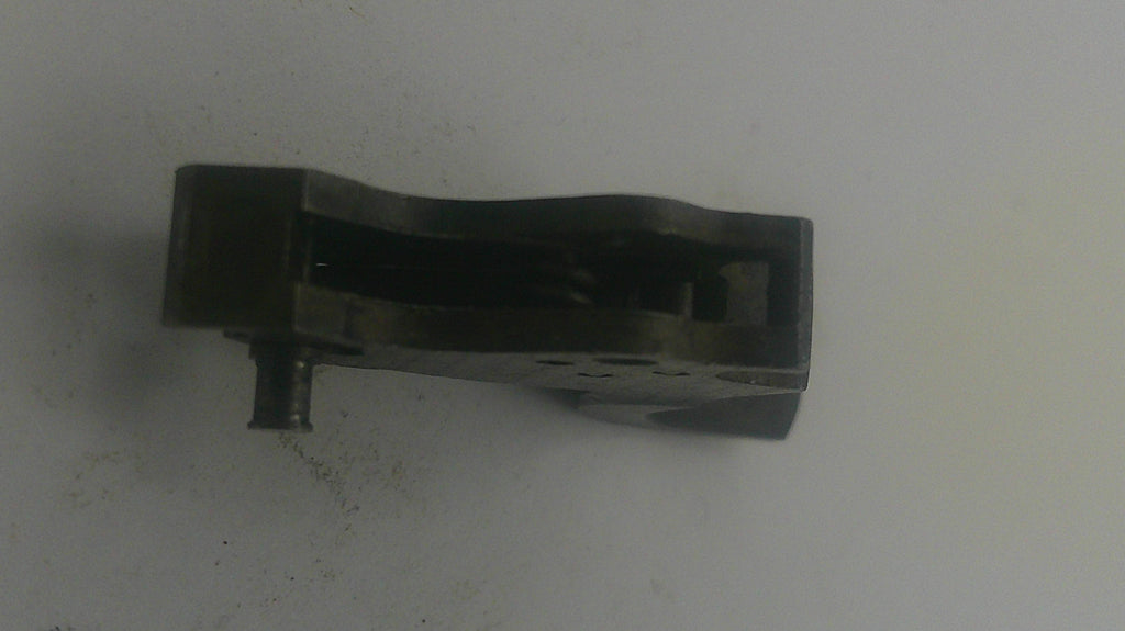 Black metal component on a white background